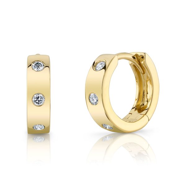 0.11CT DIAMOND MINI HUGGIE EARRING For Sale